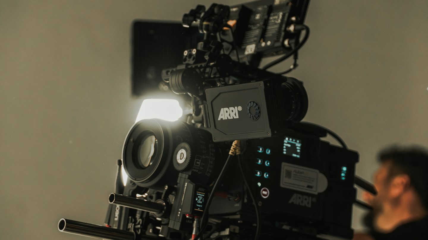 Professional cinema camera setup prepared for filming in a studio.